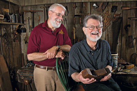 Mark Bikle (nephew of John Bast Jr) and Doug Bast in the Boonsborough Museum of History surrounded by the tools of their ancestor's cabinet making business