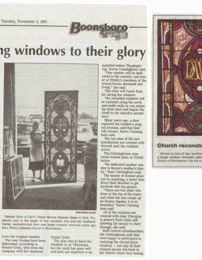 Renate Grim holds a stained glass window she reconstructed for Trinity Lutheran in Boonsboro, 2007